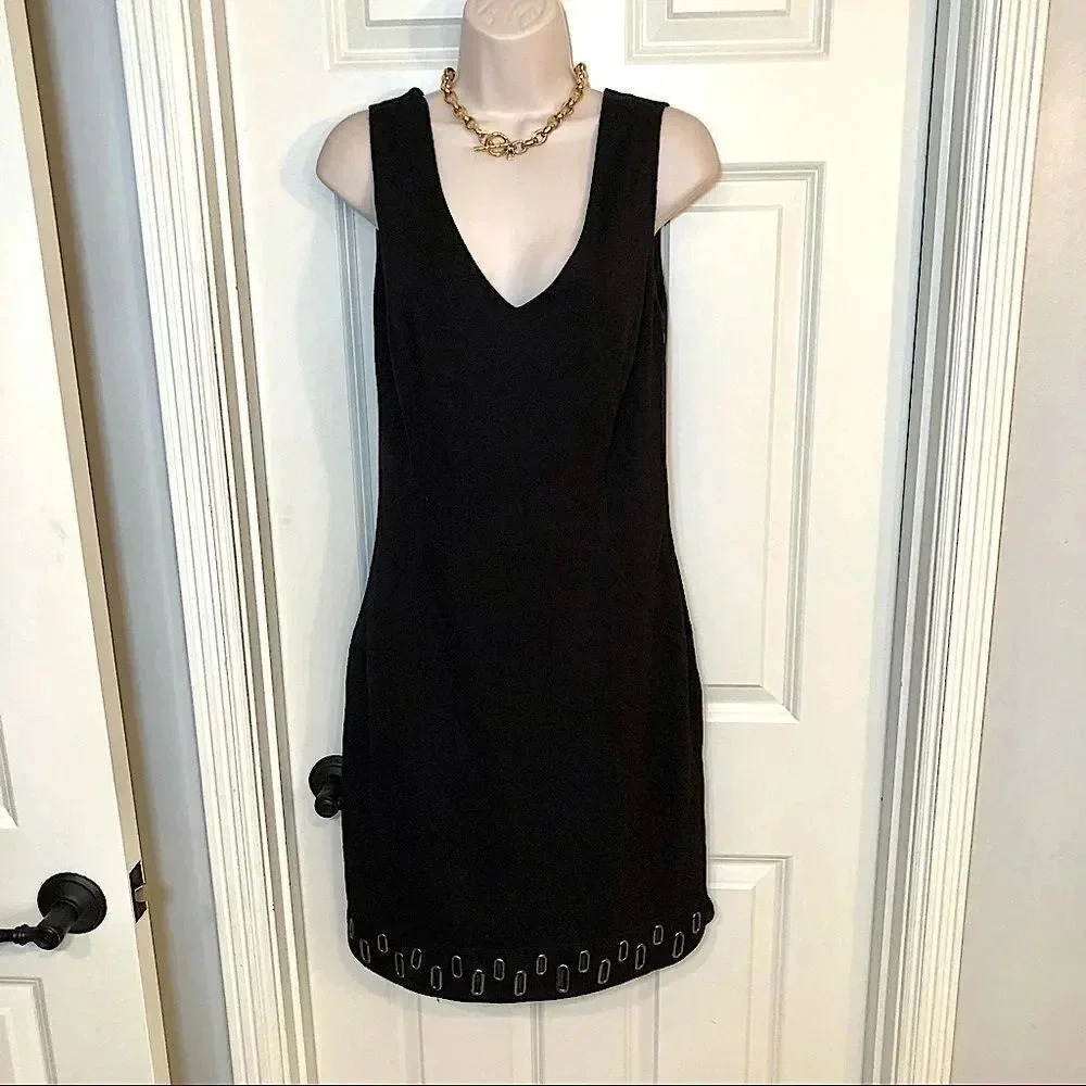 Laundry black dress with unique metal rectangles at the bottom size 4 NWT